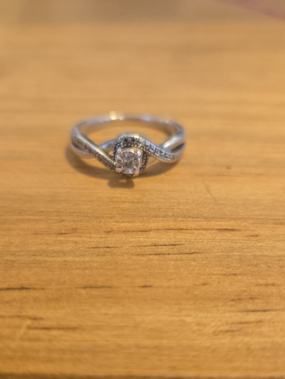 Silver Twist Halo Solitaire Ring with Clear Center Stone